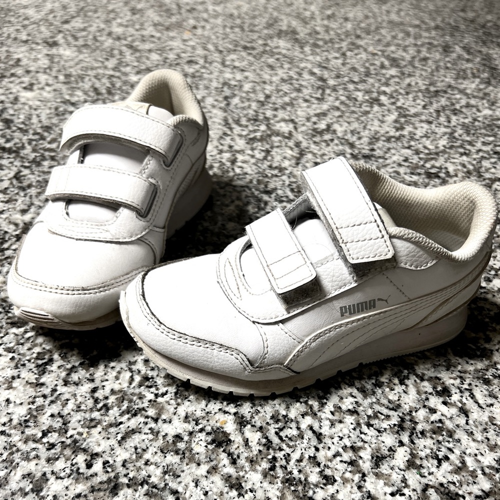 Girls Puma sneakers. Worn once. Great condition. Size 1.
